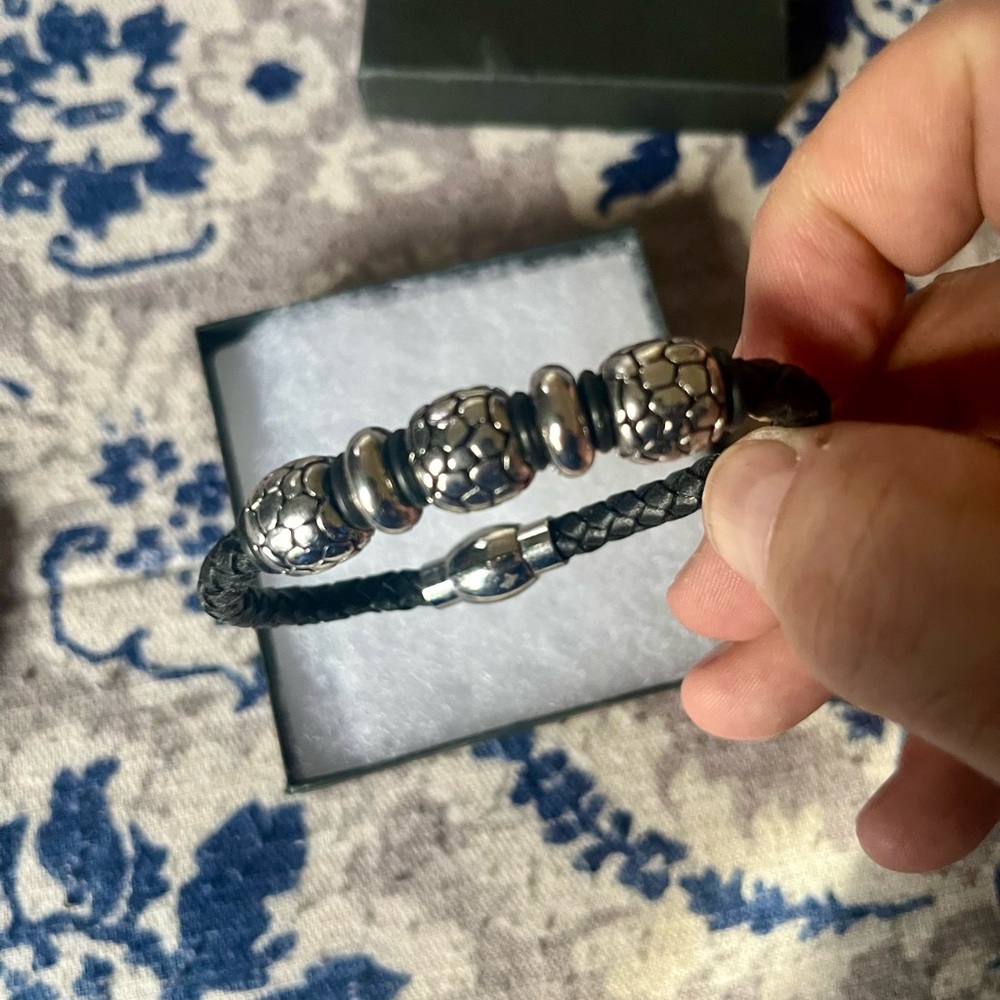New Black Braided Silver & leather Bracelet. The bracelet is 8.2 inches round.